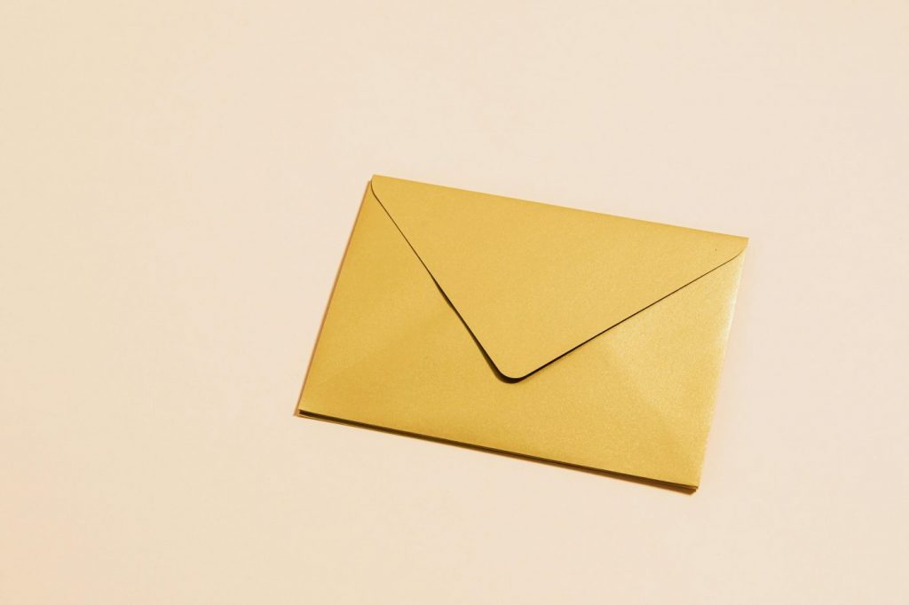 Contact Form A picture of an yellow envelope.